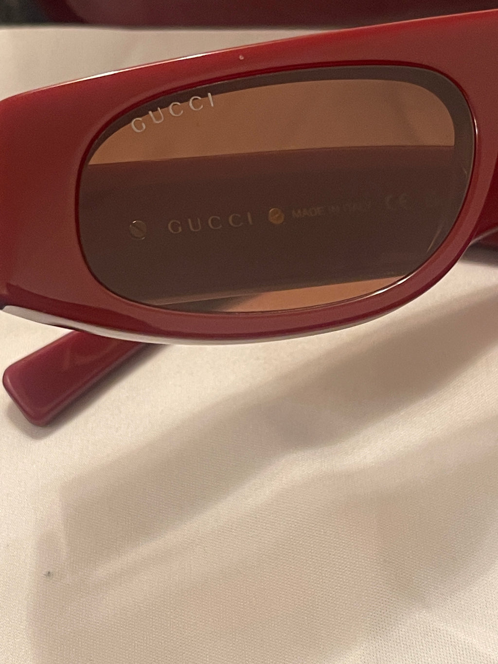 Gucci sunglasses in Ancora red