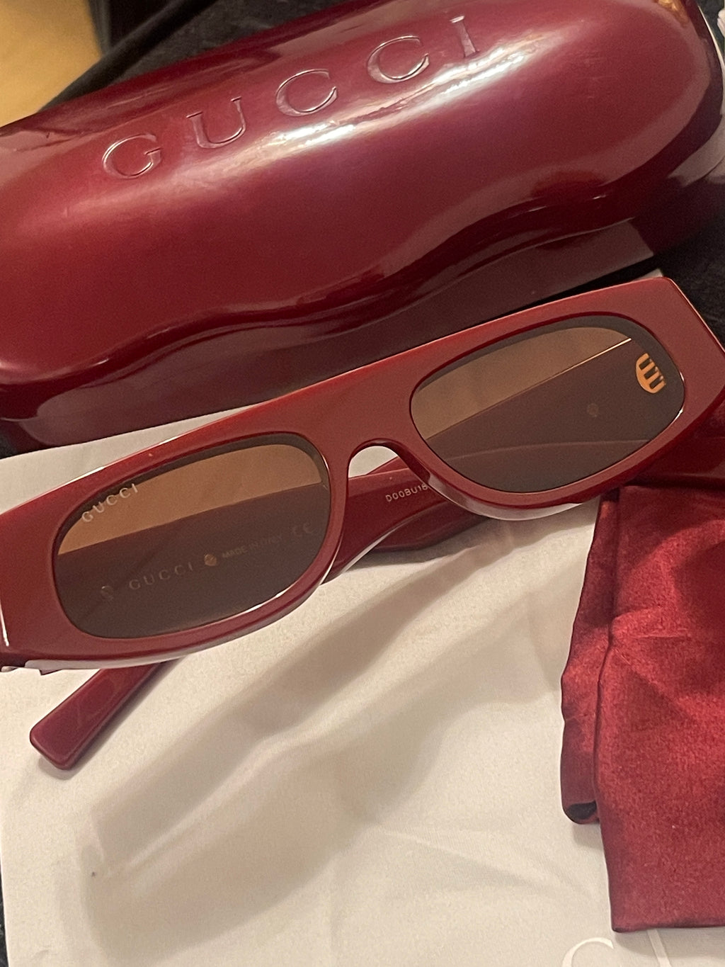 Gucci sunglasses in Ancora red