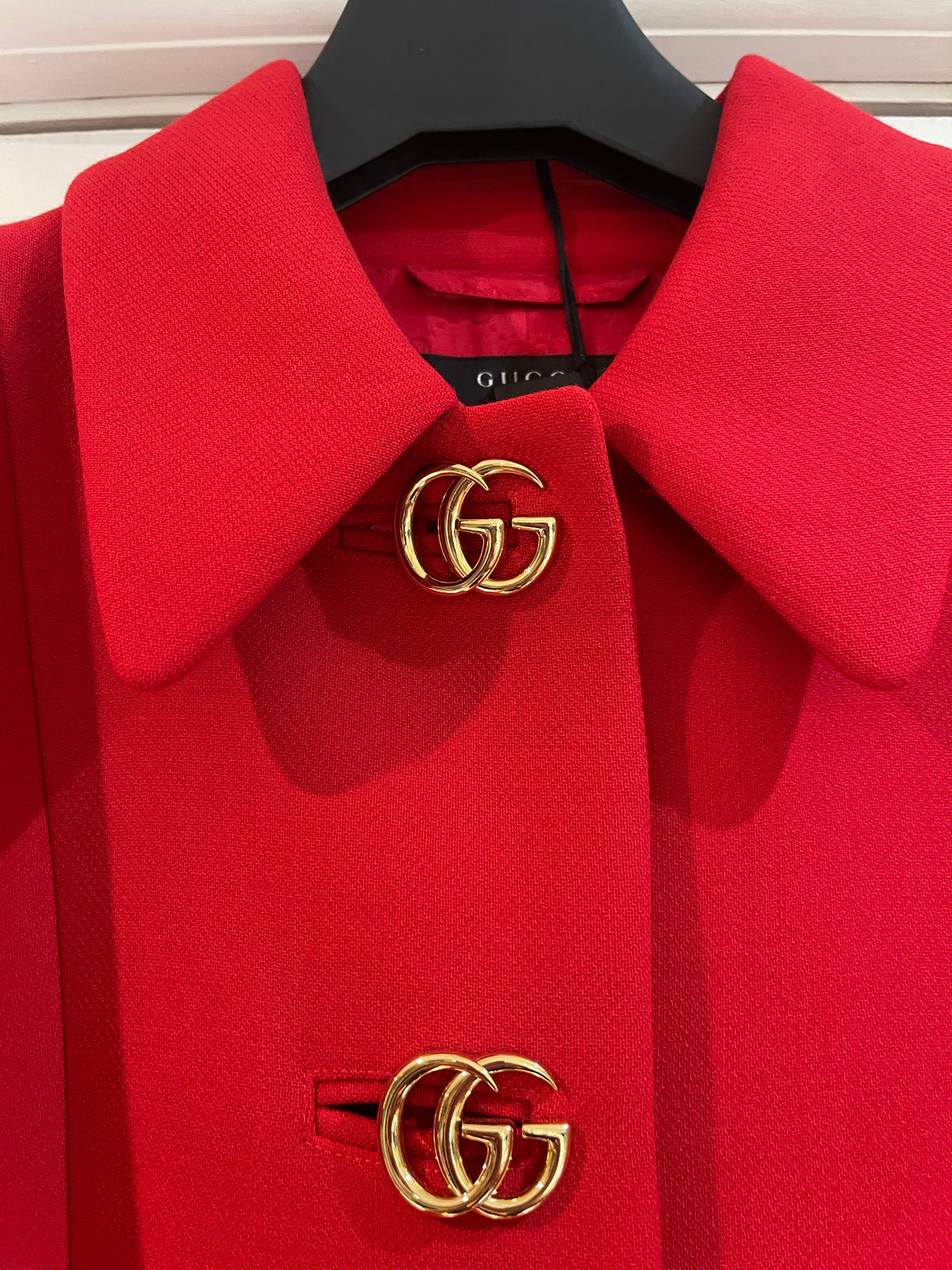 Gucci women’s wool coat in red with GG Marmont buttons
