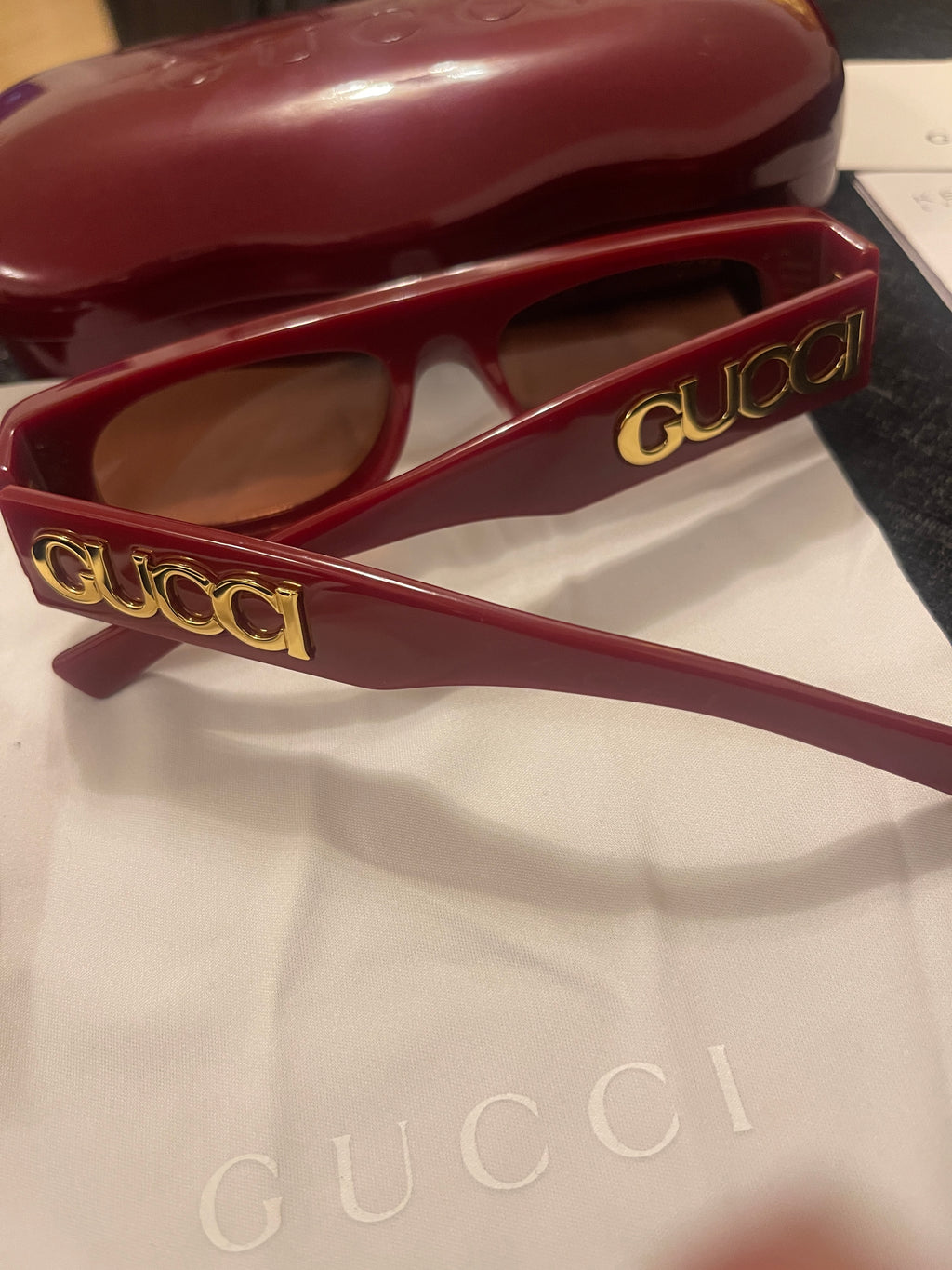 Gucci sunglasses in Ancora red